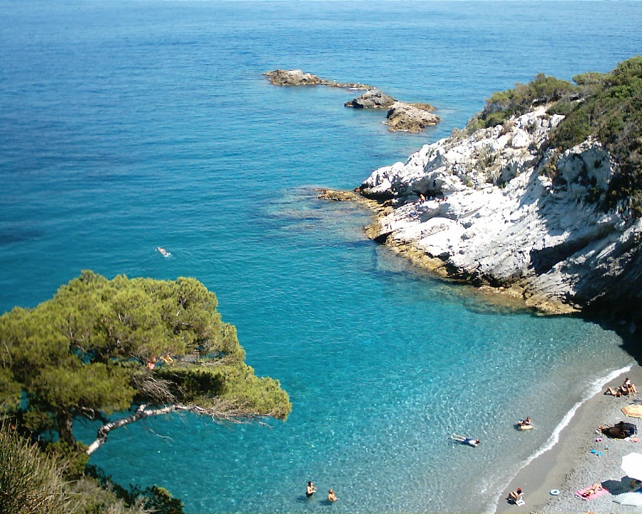 The beach of Bergeggi (Savona, Liguria) in July. 