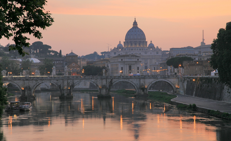 Sunset view of the Vatican with Saint Peter’s Basilica and Sant’Angelo’s Bridge
