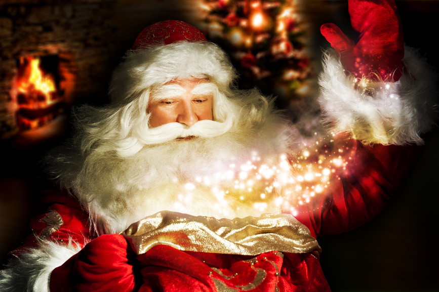 Santa Claus at home at night making magic