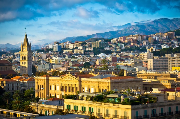 Panoramic view of the old town of Messina, Sicily, at sunset.