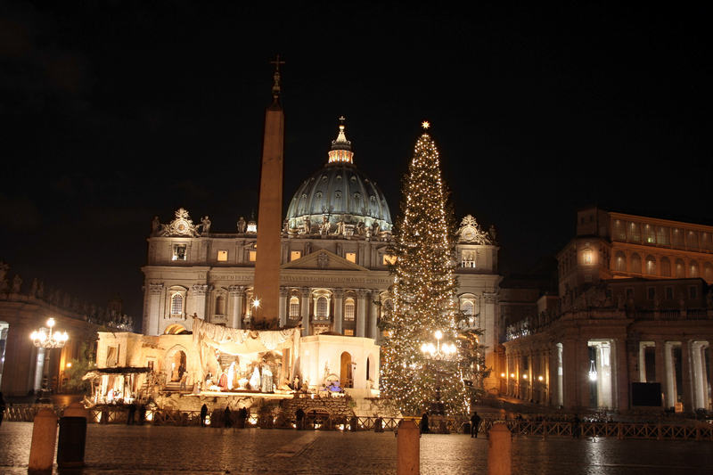 Nativity and Christmas tree in front of St Peter's Basilica, in Vatican City