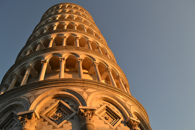 Colors of the sun captured on the white marble surface of the tower of Pisa